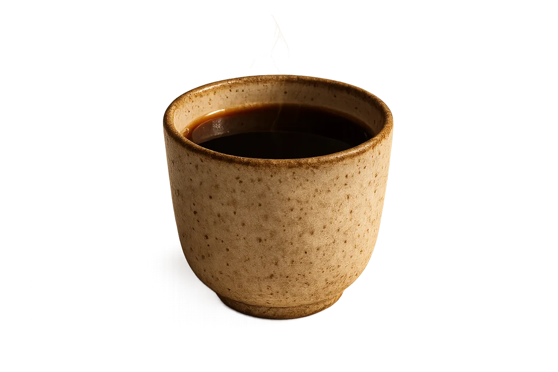 Ceramic cupping bowl of dark coffee